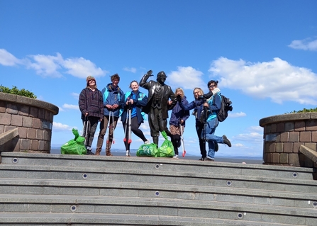 Group of people picking up litter in Morecambe