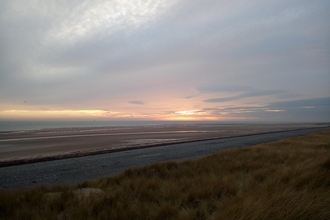 A saltmarsh at sunset