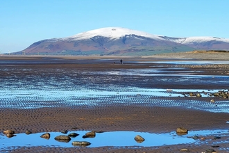 Snowy mountain and beach