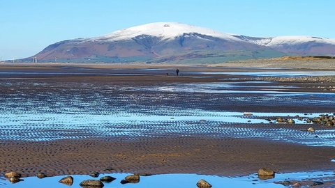 Snowy mountain and beach